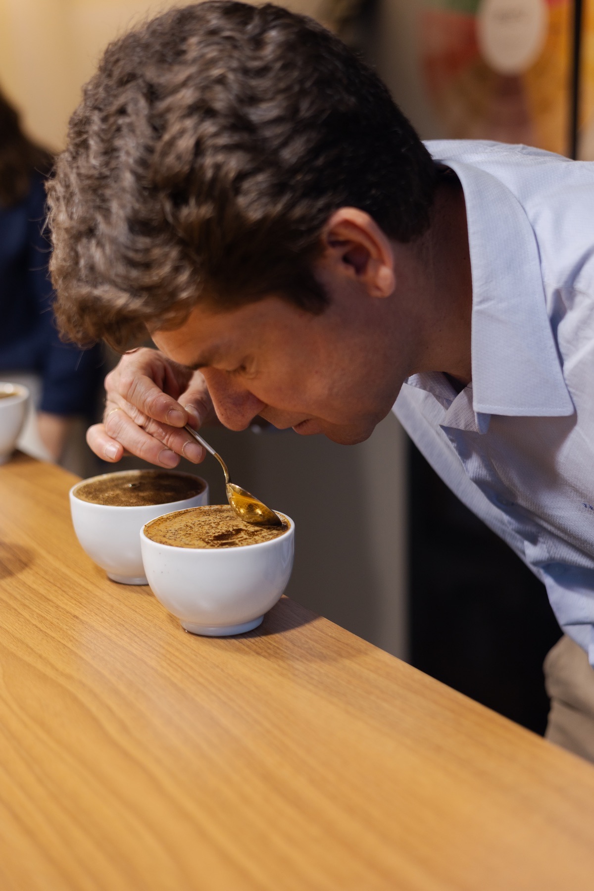 José Rezende evaluating coffee in a cupping session